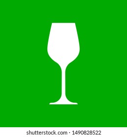 Wine glass and green background