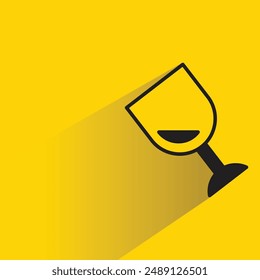 wine glass icon with shadow on yellow background