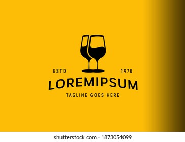 Wine glass logo design. Vector illustration of two glasses of wine. Vintage logo design with flat icon style.