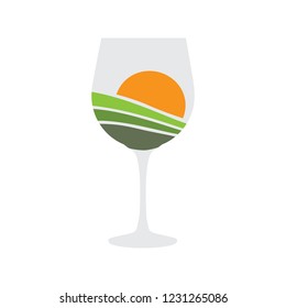 wine glass with vineyard sunset inside, logo icon
