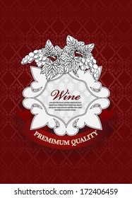 Wine label on a patterned red background.