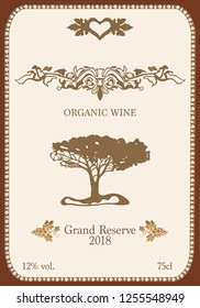 Wine label with organic ornament, tree and a bunch of grapes. Template for label
