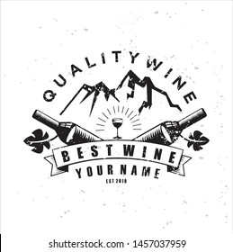 Wine logo with a vintage mountain theme using grunge effects.