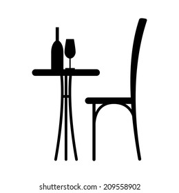 Wine on the table and chair silhouette. Silhouette of a table in a cafe. Table with wine and glass and with a chair beside him.