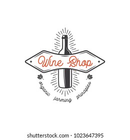 Wine shop logo template concept. bottle with leaf, sunbursts and typography design. Stock vector monochrome emblem for winery shop logotype, store isolated on white background.
