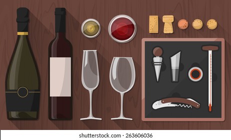 Wine tasting toolkit for wine makers, sommeliers and experts, including wine glass, bottles, corkscrews and assorted objects on wooden background