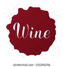 Wine written on red stain with spray around. Calligraphy hand lettering Vector illustration. Template for bar, restaurant, winery decorations. Perfect for menu, banner, poster, label, tag, logo, etc.