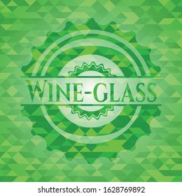 Wine-glass green emblem with triangle mosaic background. Vector Illustration. Detailed.