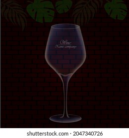 
Wineglass with red wine on a brick wall background