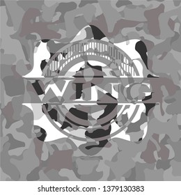 Wing grey camouflaged emblem