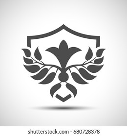 Wing leaves. Abstract shield with leaves. Security sign. Unique template of the security company. 