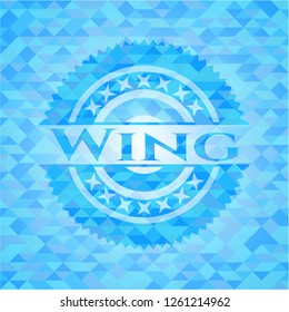 Wing light blue emblem. Mosaic background