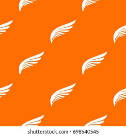 Wing pattern repeat seamless in orange color for any design. Vector geometric illustration