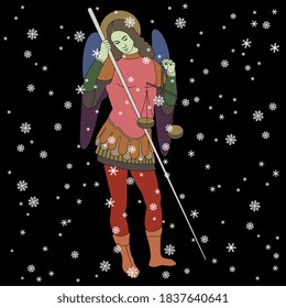 Winged angel or archangel with wages and spear standing under snowflakes. Religious winter Christmas decoration.