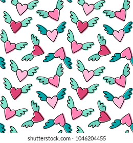 Winged flying hearts. Seamless vector pattern.