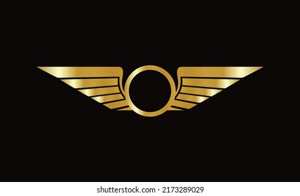 winged gold logo with circle