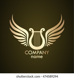 winged lyre gold logo / music symbol