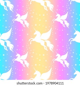 Winged unicorn and stars seamless pattern. Silhouette of a flying unicorn on the starry sky. Silhouette white on a rainbow background.  Vector illustration.