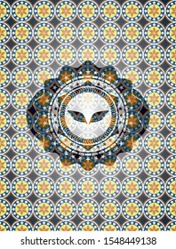 wings icon inside arabic badge background. Arabesque decoration.