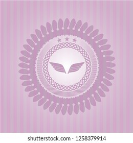 wings icon inside badge with pink background