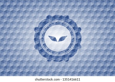 wings icon inside blue badge with geometric background.