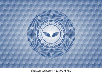 wings icon inside blue badge with geometric background.