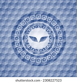 wings icon inside blue badge with geometric pattern background. 