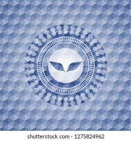 wings icon inside blue emblem with geometric pattern background.