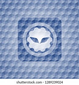 wings icon inside blue emblem or badge with abstract geometric pattern background.