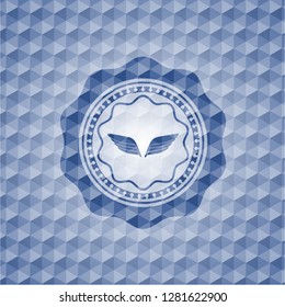 wings icon inside blue hexagon emblem.