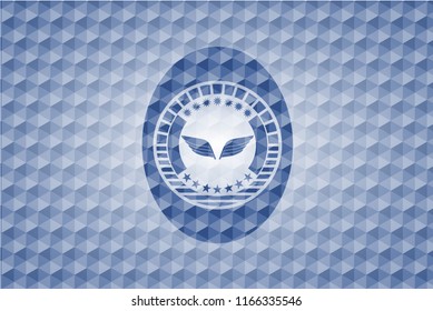 wings icon inside blue polygonal emblem.
