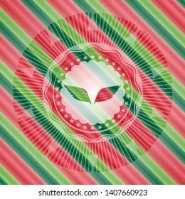 wings icon inside christmas emblem.