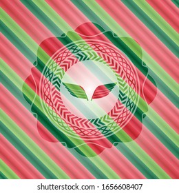 icono de alas dentro del fondo del emblema de Navidad.
