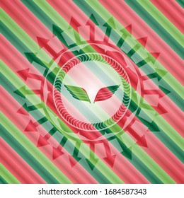 wings icon inside christmas style badge..