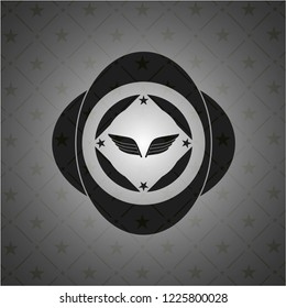 wings icon inside dark badge or emblem
