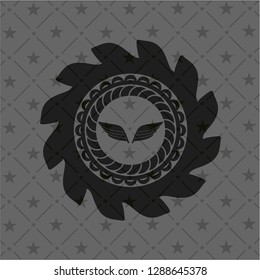 wings icon inside dark badge