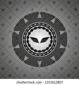 wings icon inside dark emblem. Retro