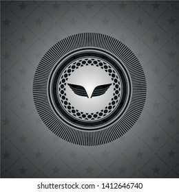 wings icon inside dark emblem. Retro