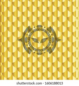 wings icon inside gold emblem or badge. Scales pattern. Vector Illustration. Detailed.