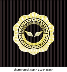 wings icon inside gold shiny emblem