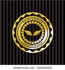 wings icon inside gold shiny badge