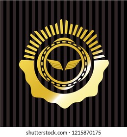 wings icon inside gold shiny emblem
