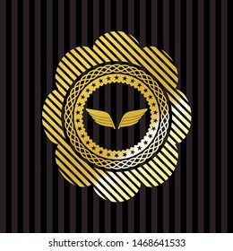 wings icon inside golden emblem
