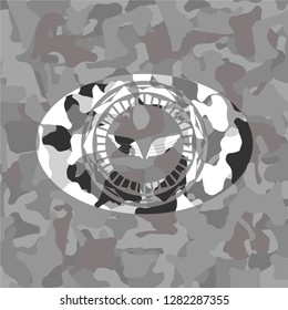 wings icon inside grey camouflage texture