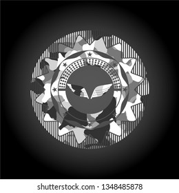 wings icon inside grey camouflage emblem