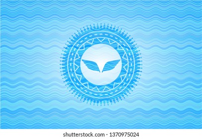 wings icon inside light blue water emblem.