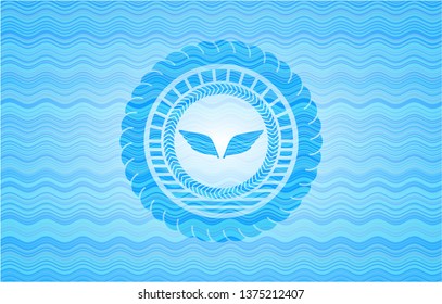 wings icon inside light blue water emblem background.