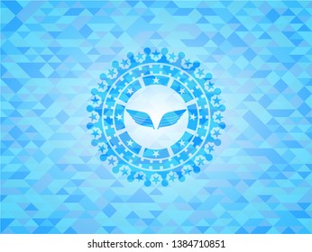 wings icon inside light blue emblem. Mosaic background