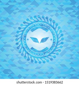 wings icon inside light blue emblem with mosaic ecological style background