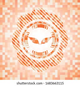 Flügelsymbol in orangefarbenem Mosaik
